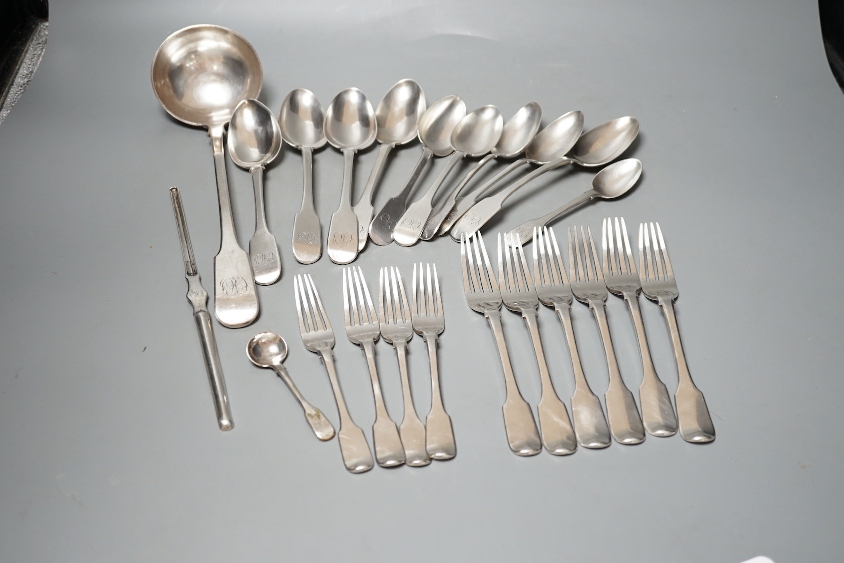 Twenty three items of continental white metal fiddle pattern flatware, stamped GH, including a soup ladle and marrow scoop